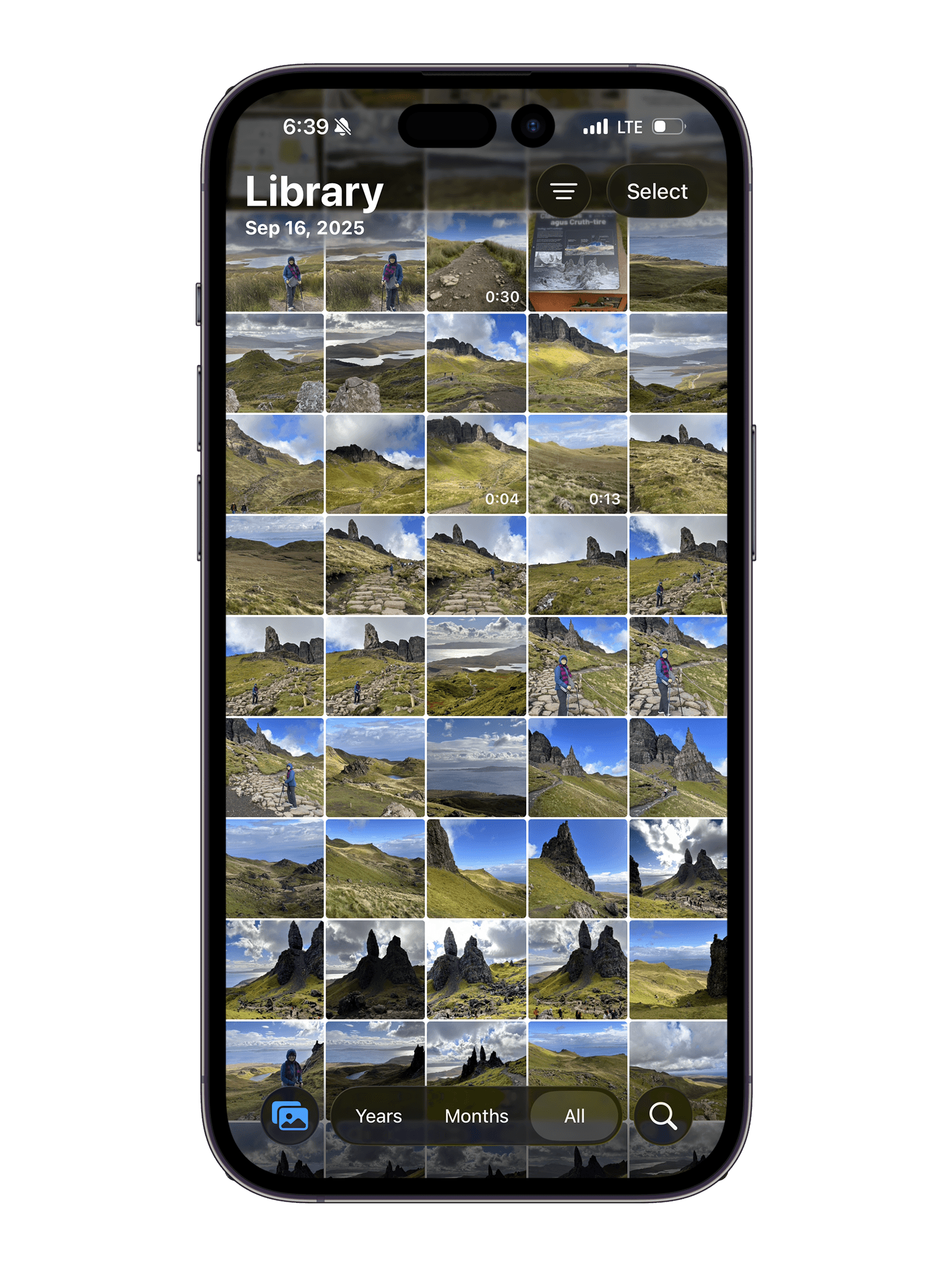 A photo library grid — hundreds of photos, no story